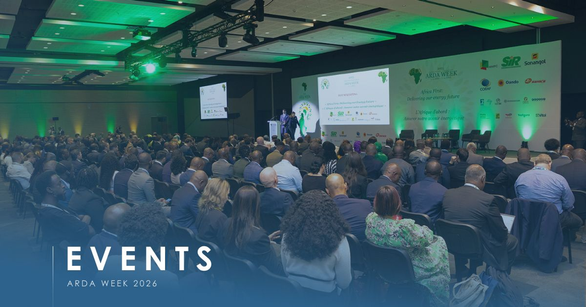 Packed conference hall at ARDA Week 2026 with a speaker on stage and sponsor logos on the screens